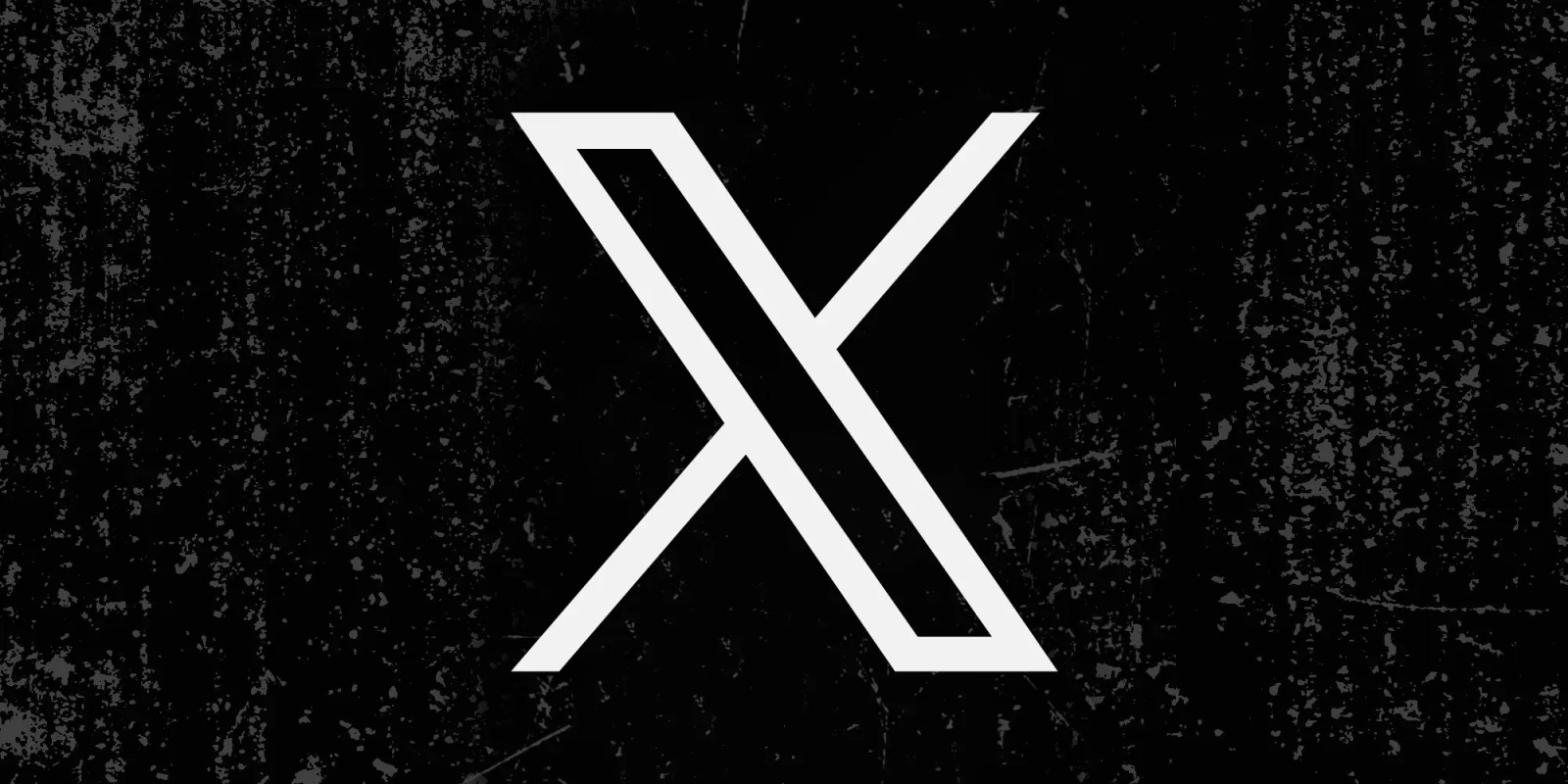 X обзор | Логотип компании на гранж-фоне