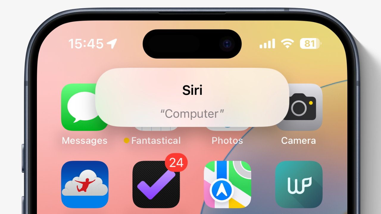 Крупный план экрана смартфона: на экране Siri отображается запрос «Компьютер» со значками различных приложений, включая «Сообщения», «Камера» и «Фантастика».