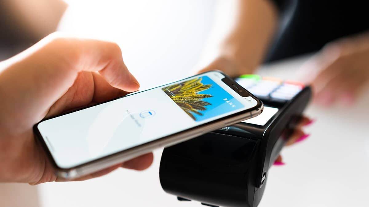 Как работают безопасные бесконтактные транзакции NFC в iOS 18