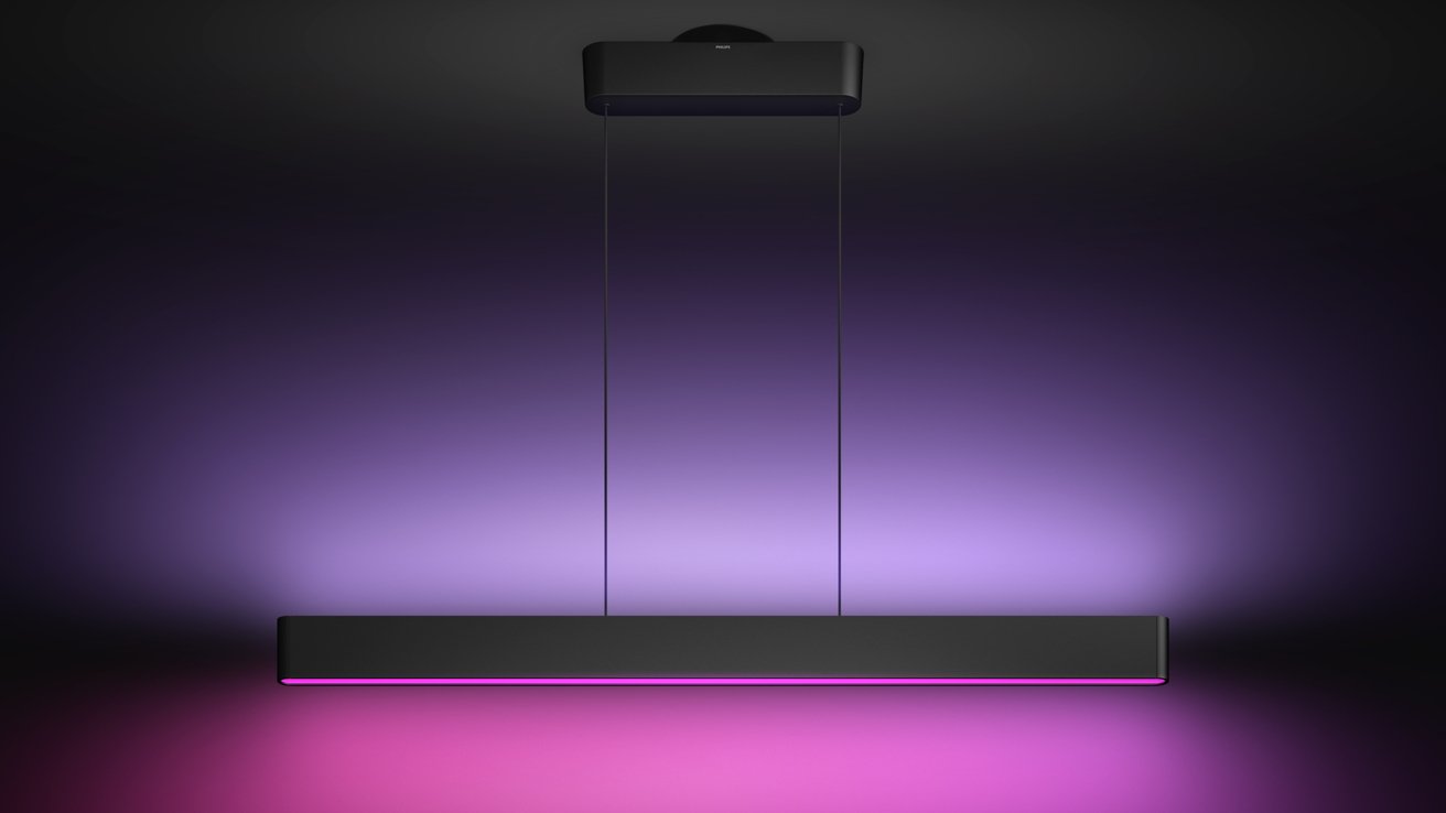 Новый подвесной светильник Philips Hue Ensis на темном фоне со светом, перемещающимся вверх и вниз
