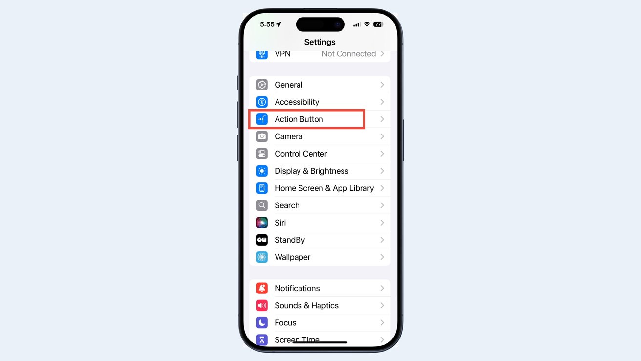 Экран iPhone, на котором отображается меню настроек, в котором красным выделена опция «Кнопка действия», а также видны дополнительные настройки, такие как «Wi-Fi», «Специальные возможности» и «Уведомления».