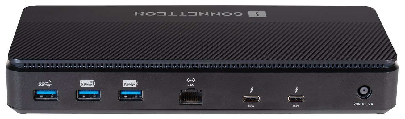 Черное электронное устройство с тремя портами USB, портом Ethernet, двумя портами Thunderbolt и входом питания на задней панели.